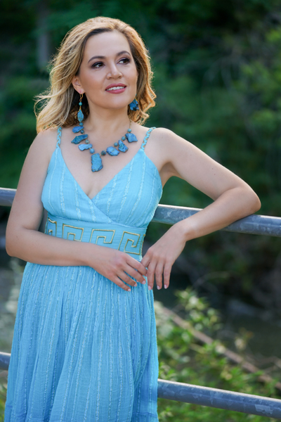 Turquoise Muse jewellery set shown on a model